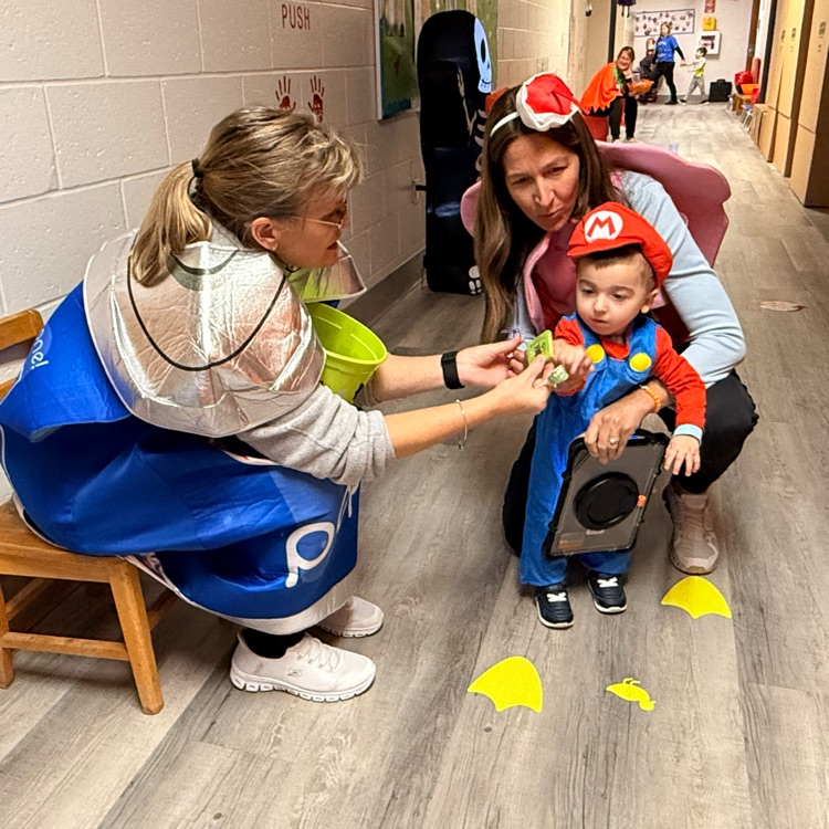 adults and child in costumes 