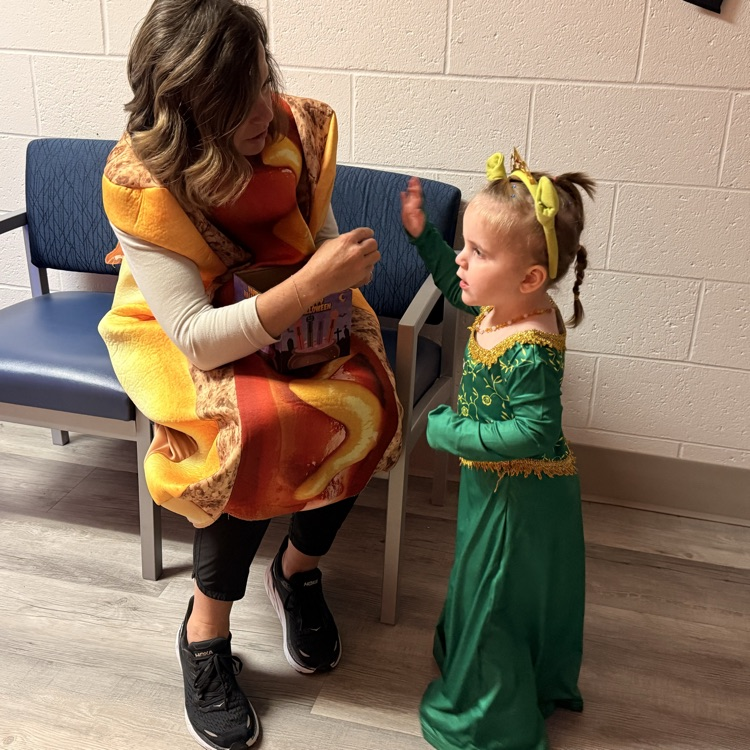 adults and child in costumes 