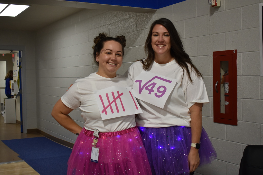 Staff dressed as the numbers 6 and 7