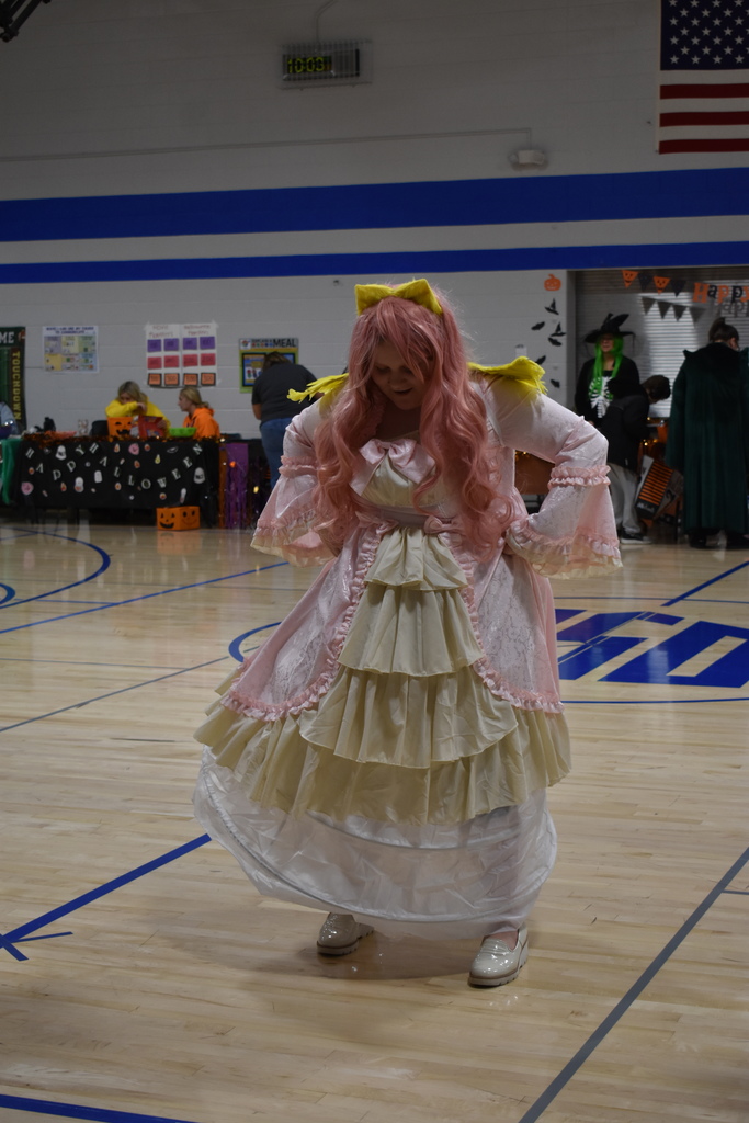 A student dances in costume