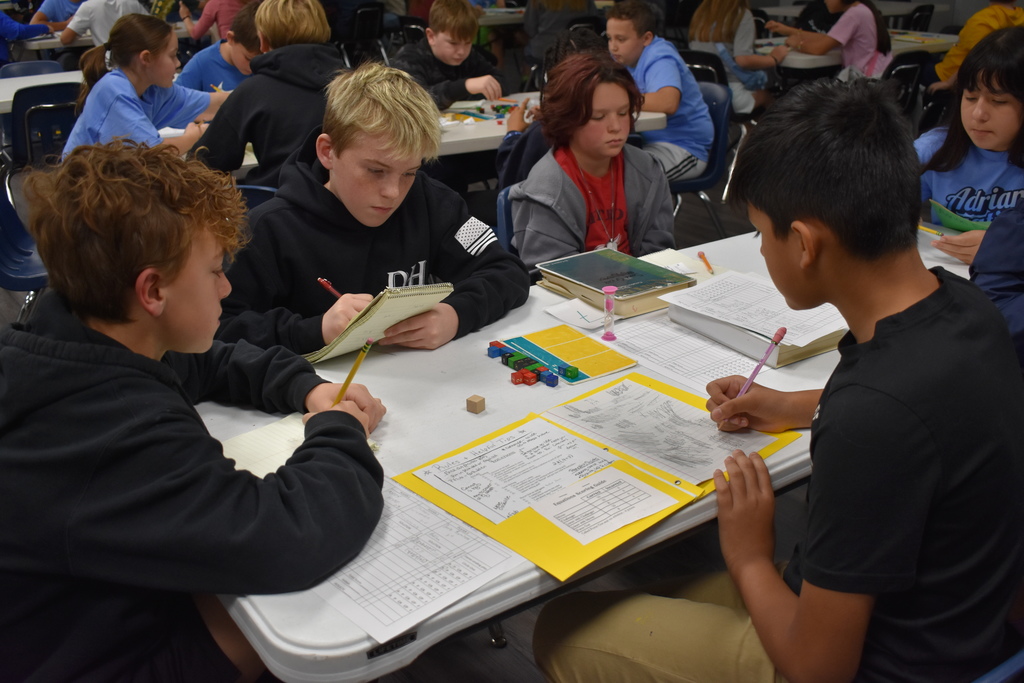 Students playing equations