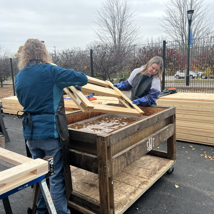two people dipping a headboard