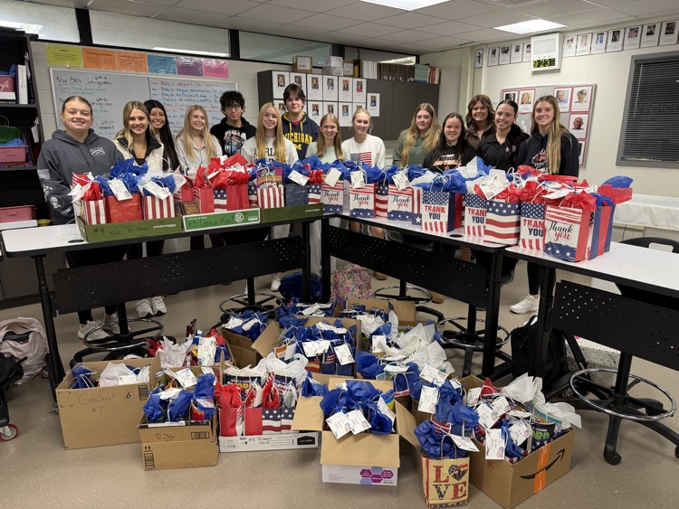 students with gift bags