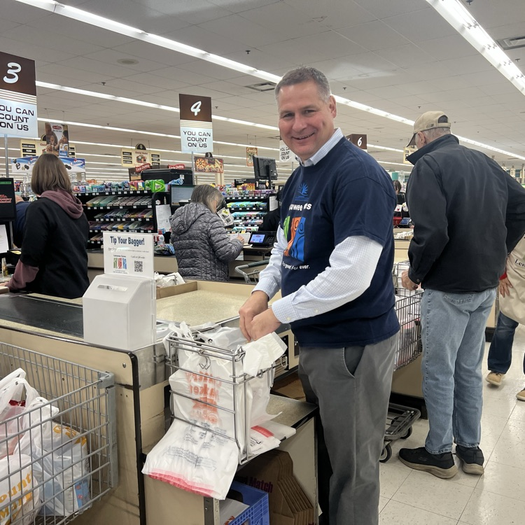mark Haag bagging groceries