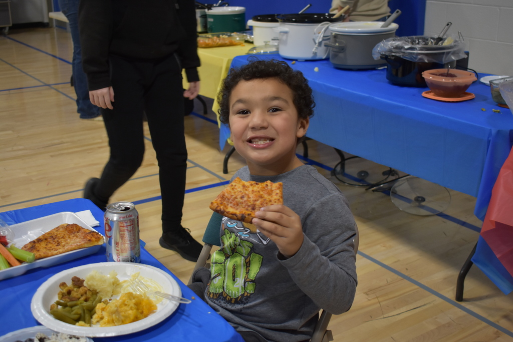 Student eating his meal