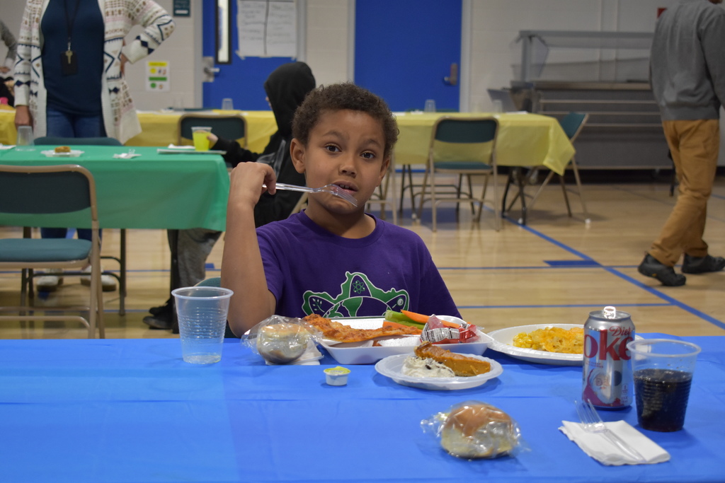A student eating his meal
