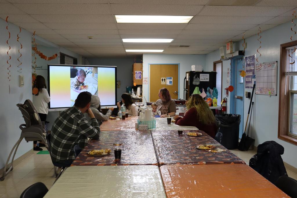 People gathered around a table at PREP