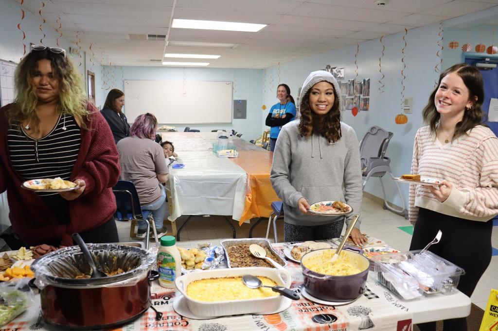 Two PREP students choosing their meals