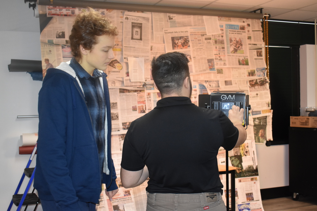 A student learns about photography in our Digital media program during a tour