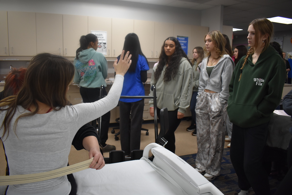 CNA students demonstrate for guests