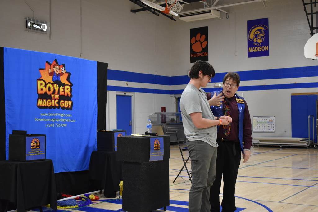A student being shocked by a magic trick