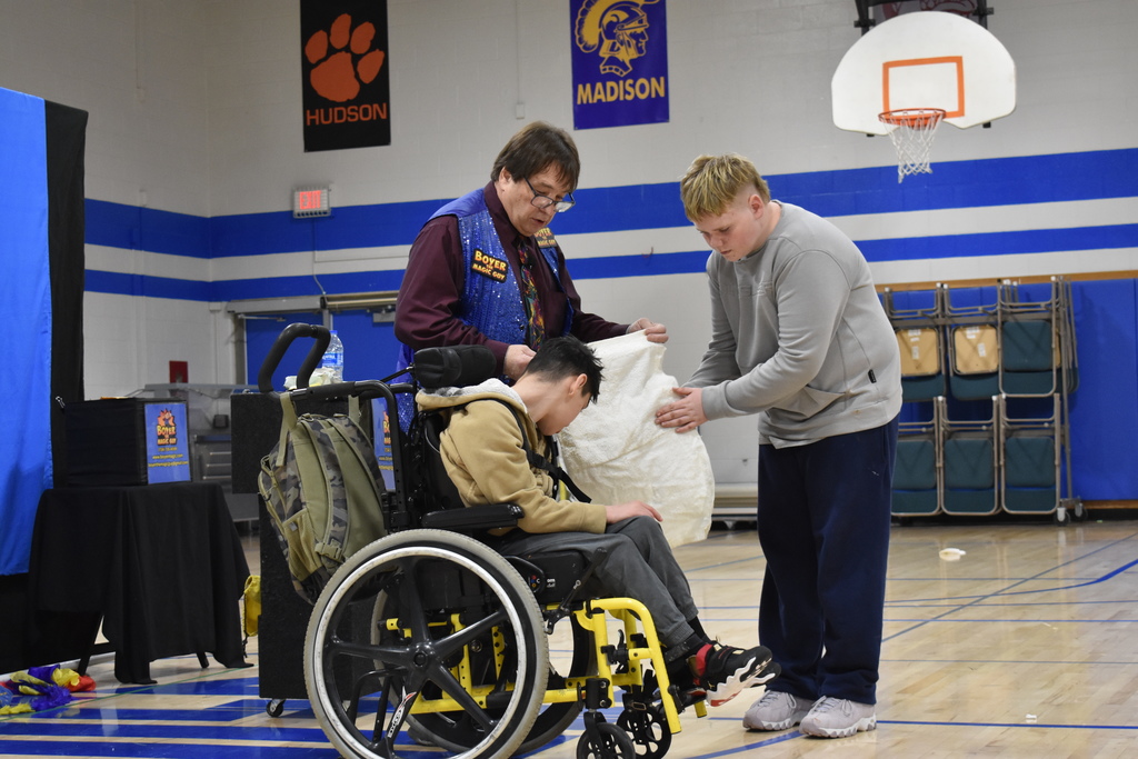 Two students participating in a magic trick