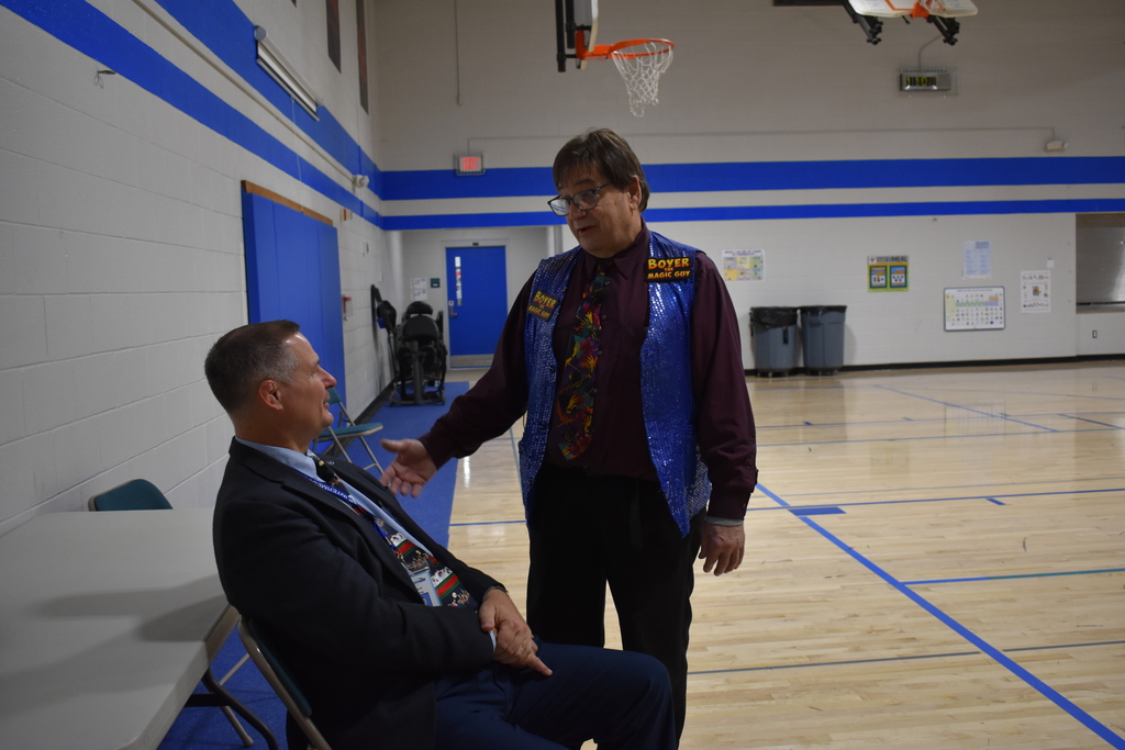 The magician chatting with our Superintendent