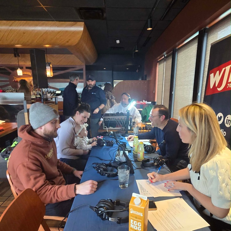 WJR staff talking to Mikayla and her daughter