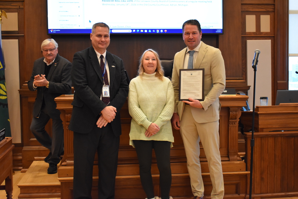 Mark Haag, Yvonne Thomas and Dustin Krasny posing for a photo