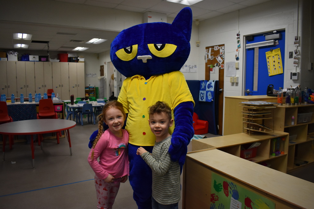 Pete the Cat with two students