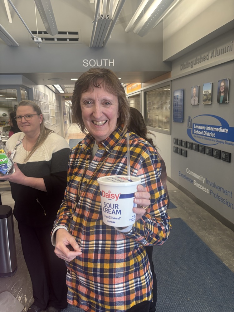 staff with sour cream container