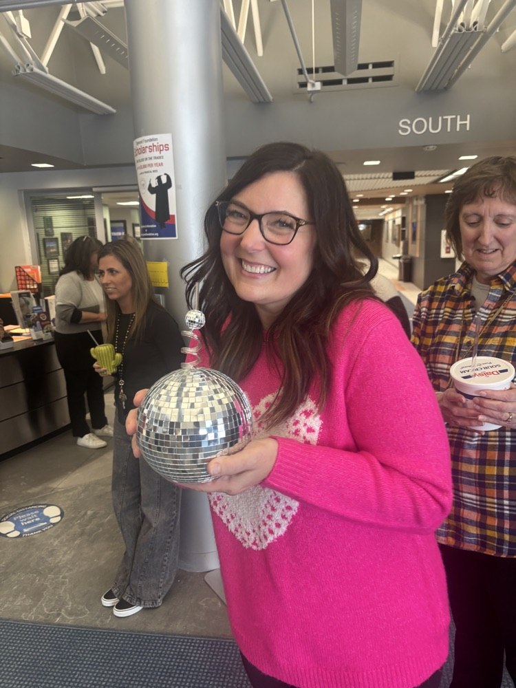 staff with a disco ball