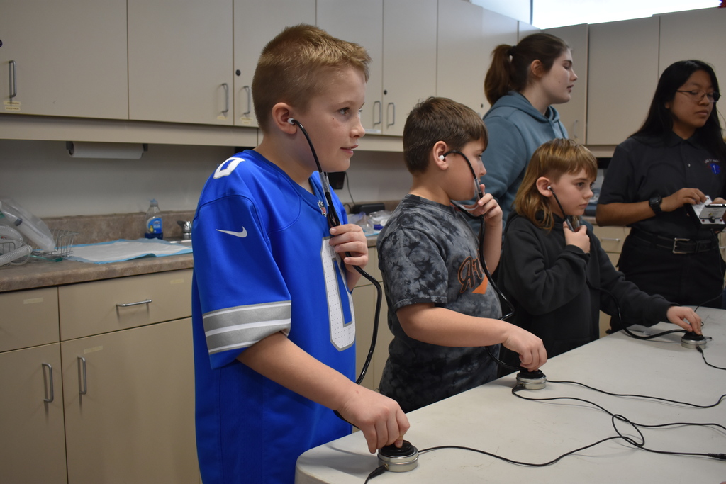 Students use equipment in the EMT space