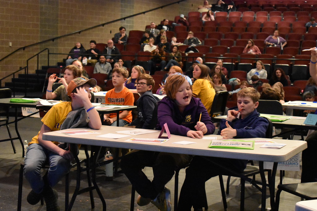 Students working hard on a question