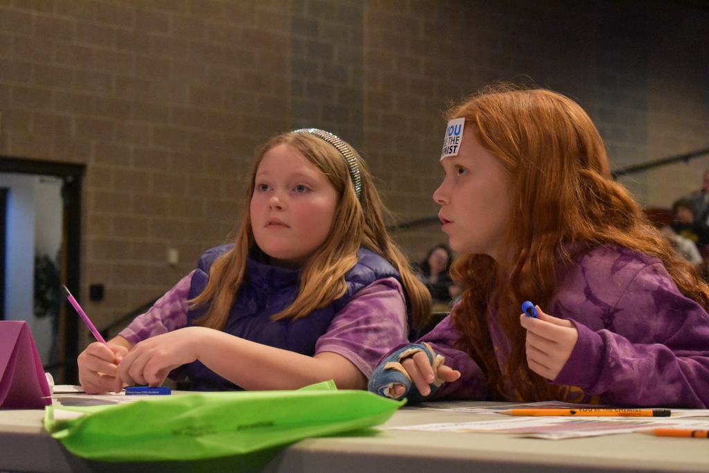 Two students thinking about a questions