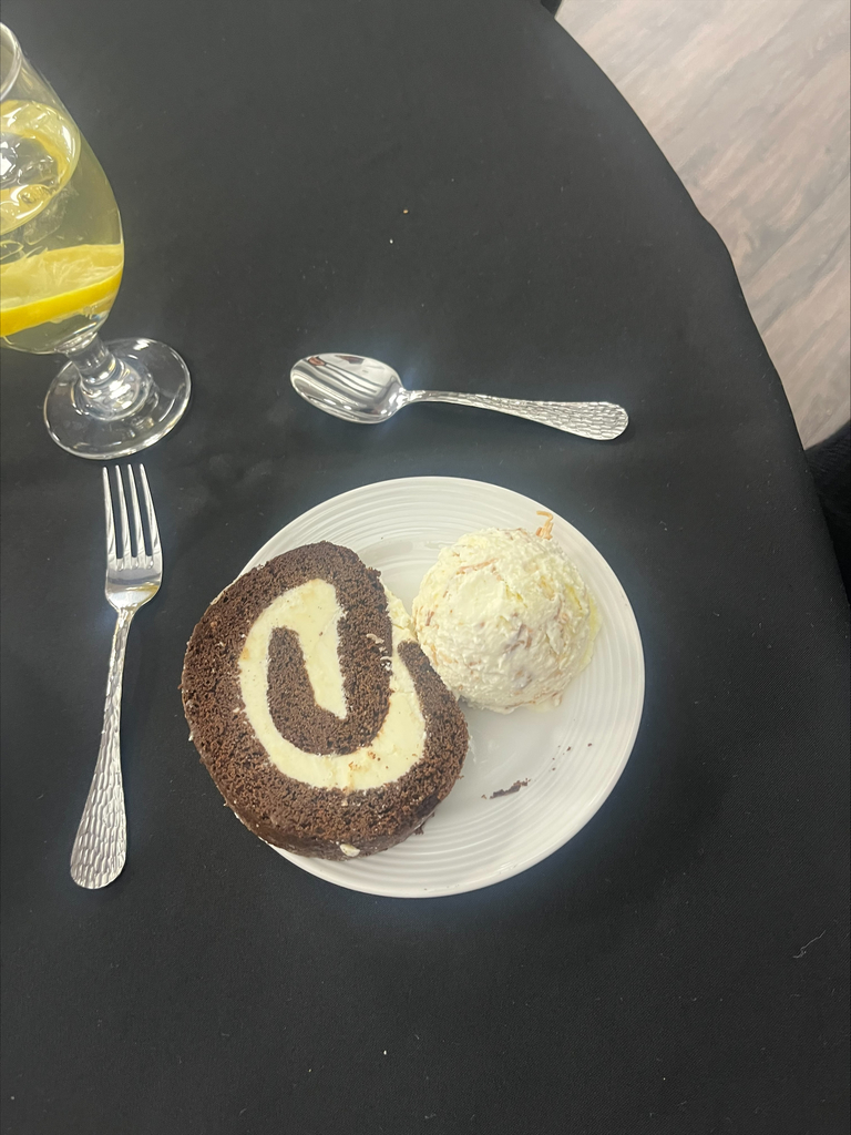 Dessert of ice cream and a cake with a center frosting