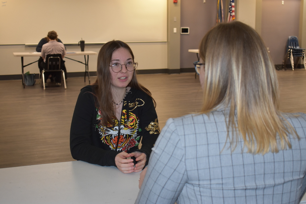 A student interviewing