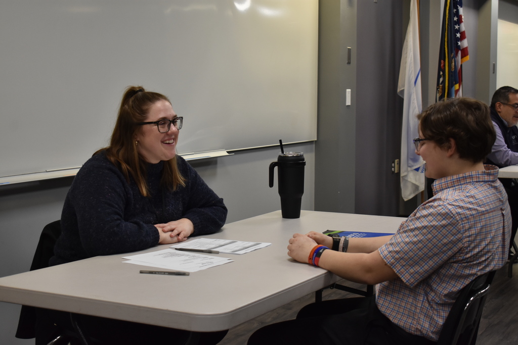 A student and an interviewer