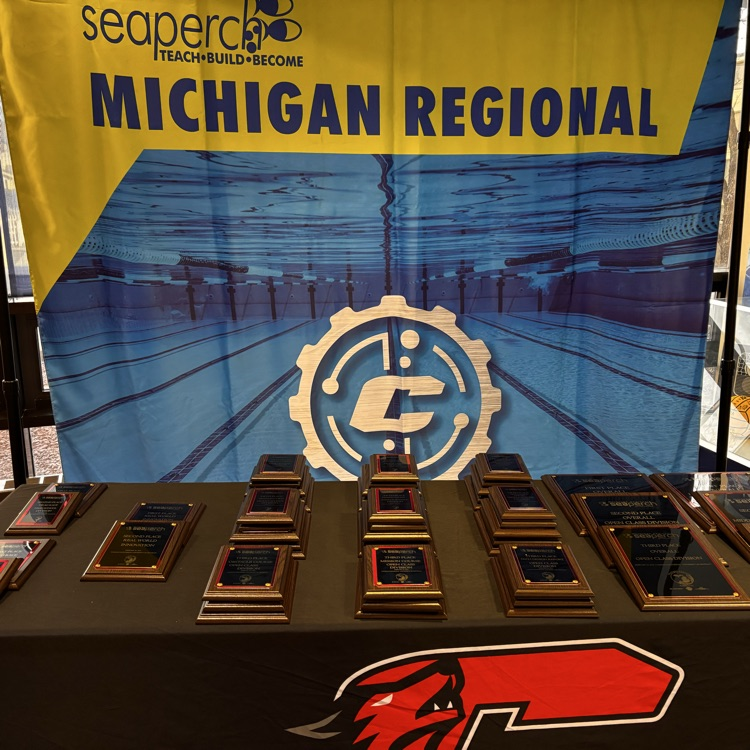 trophies are set up on a table