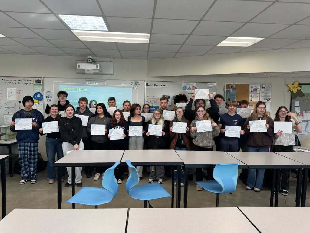 AM students with certificates