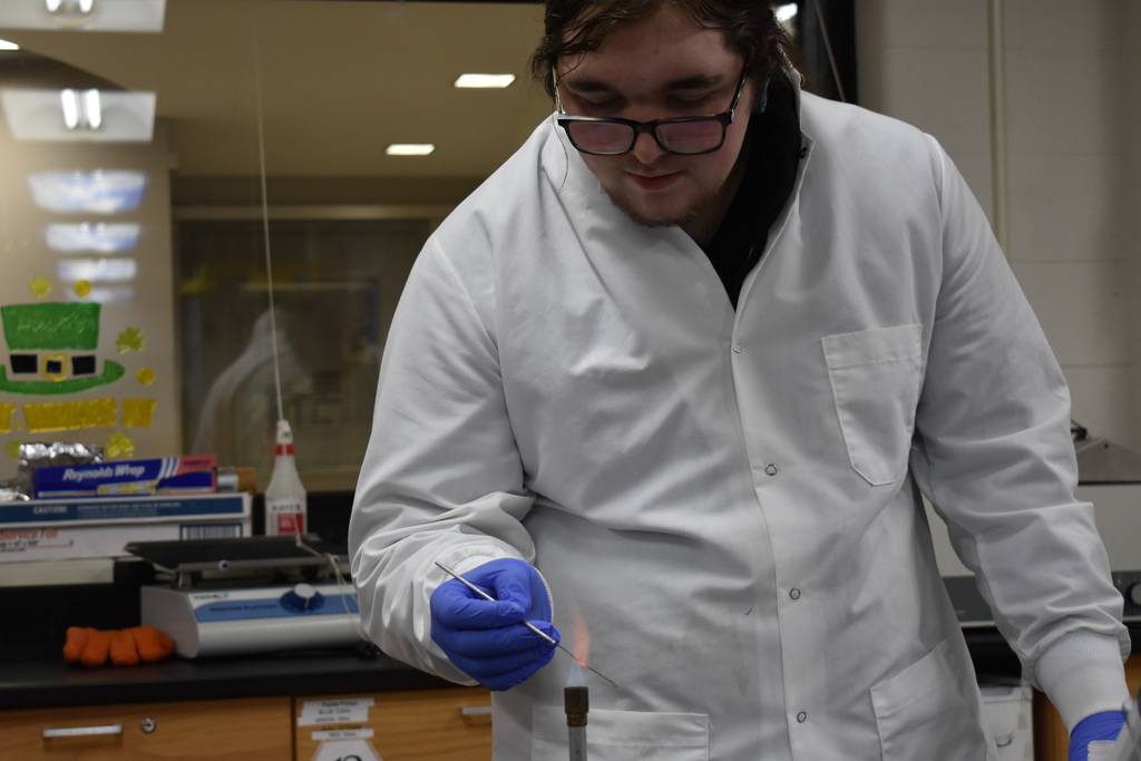 A bio chem student working on an experiment
