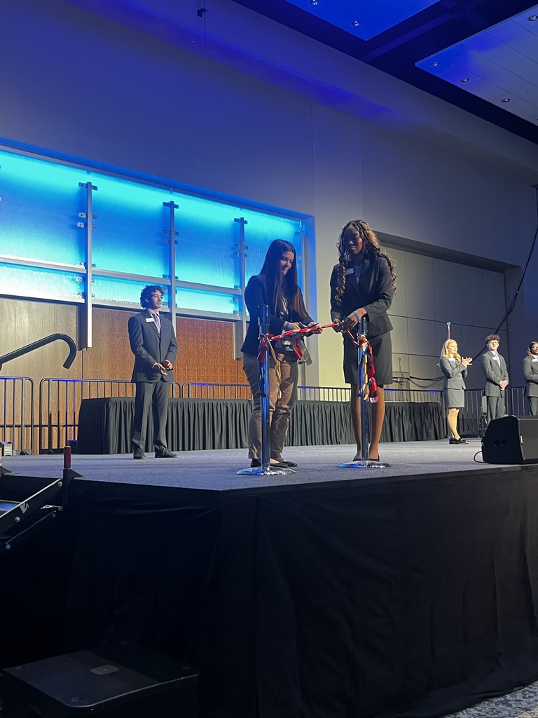 Cutting the Ribbon at Opening Ceremony