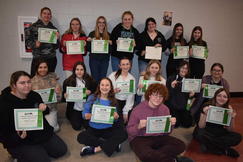 Clinton Students posing in the hallway with their STEM Fair Awards