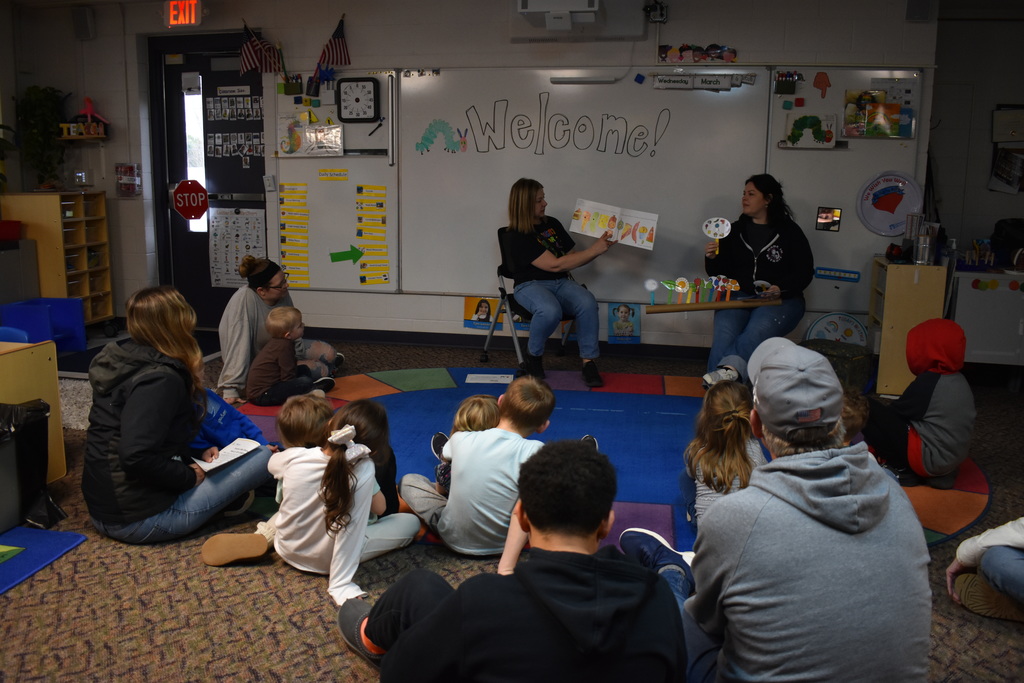 Teachers reading to families