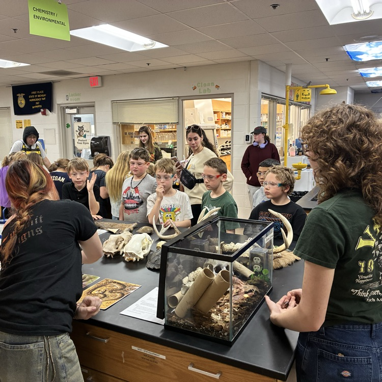 Students learning about skulls from TECH Center students