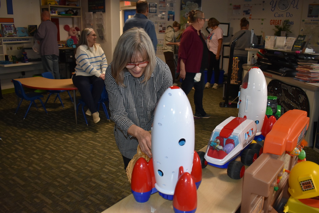 a staff member searching for eggs