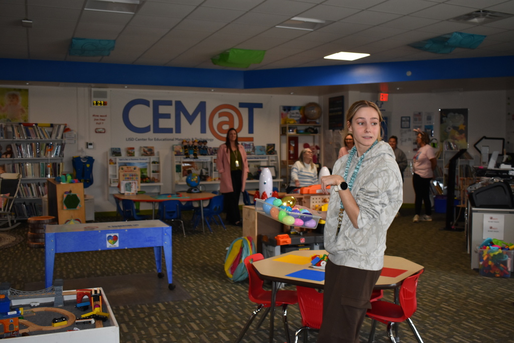 A staff member searching for eggs