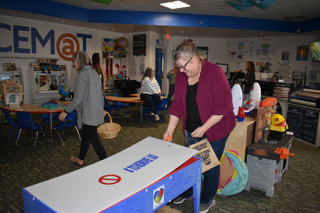 a staff member searching for eggs