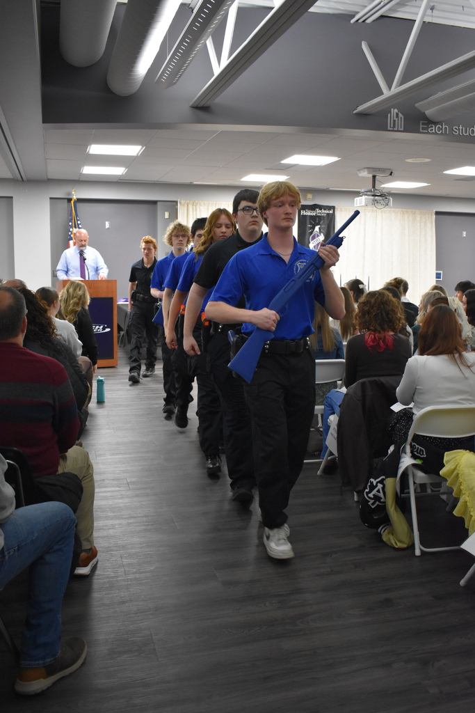Law enforcement students marching into the ceremony