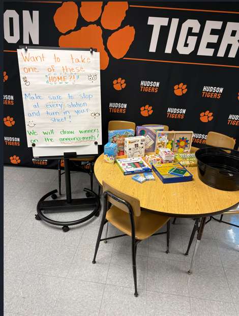 A setup of games on a table for Math Night