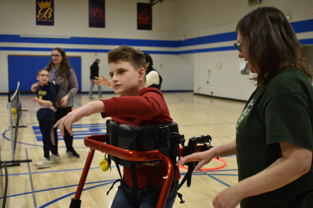 A student throwing the ball