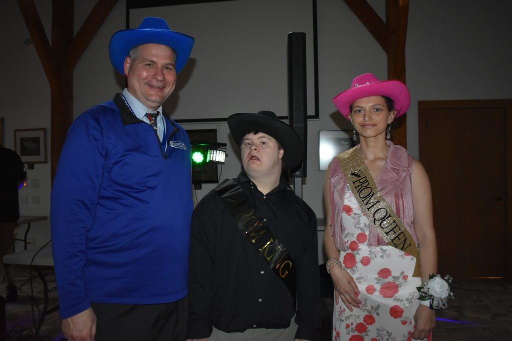 Homecoming King and Queen with the Superintendent