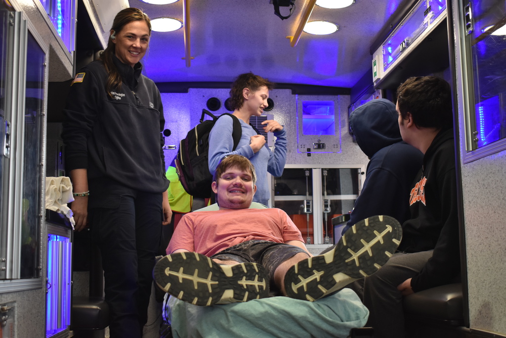 Students getting an inside look in an ambulance
