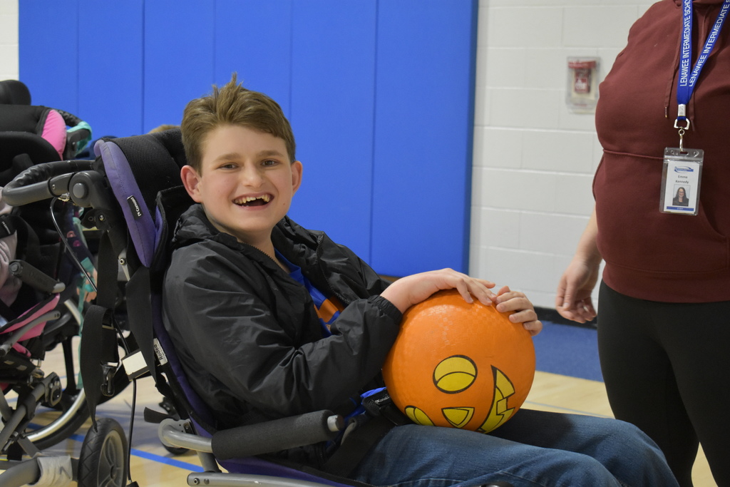 A student playing a game with a ball
