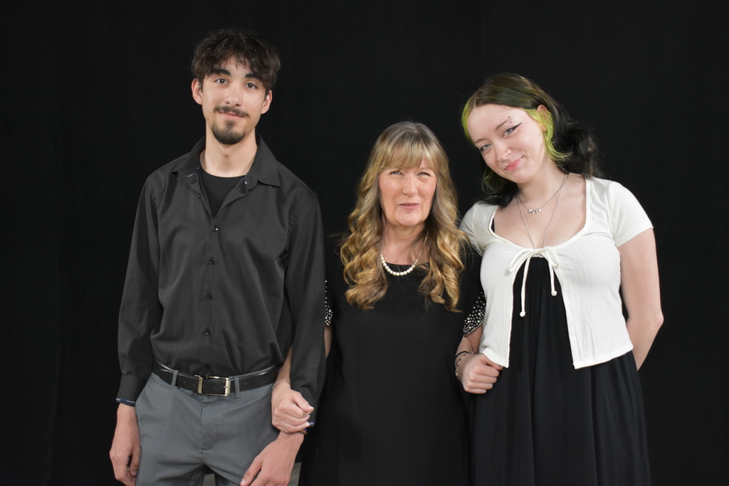 Two students with their instructor