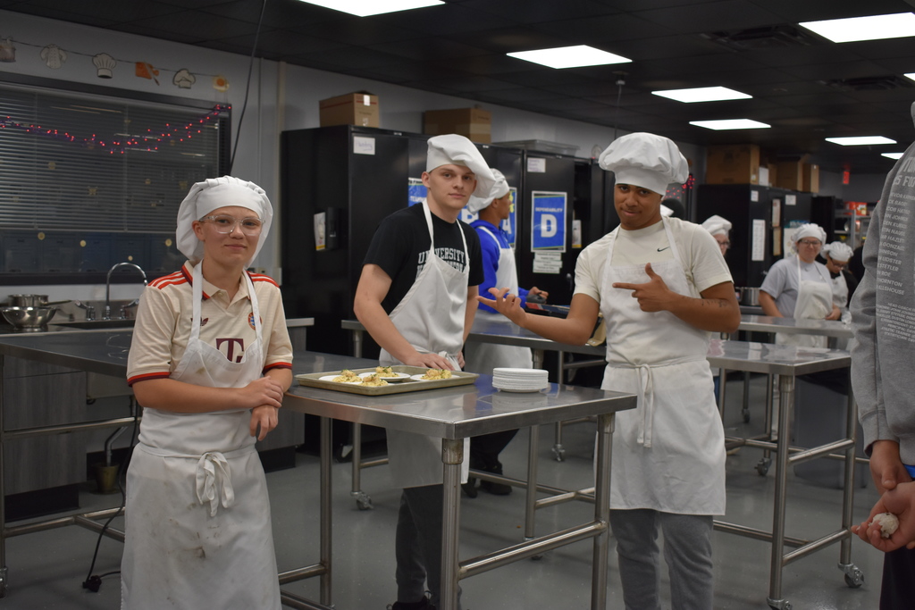 one of the winning teams posing for a photo