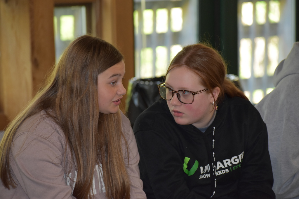 Two students conversing 