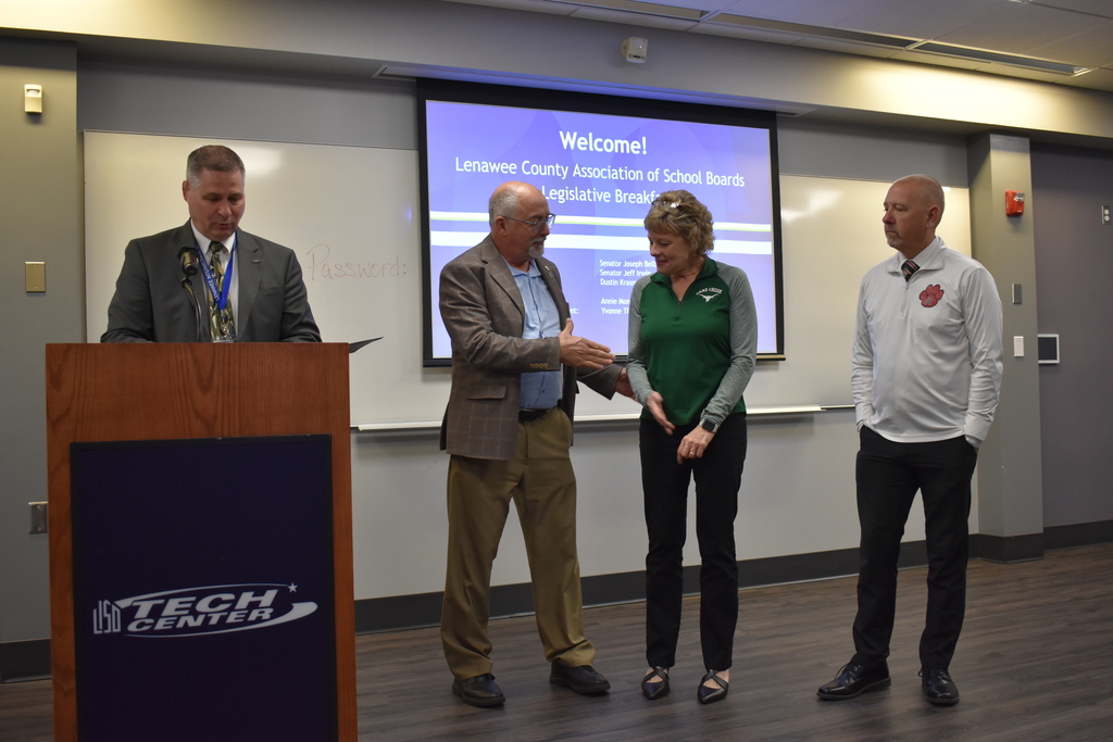 Senator Bellino shaking Sharon Smith's hand