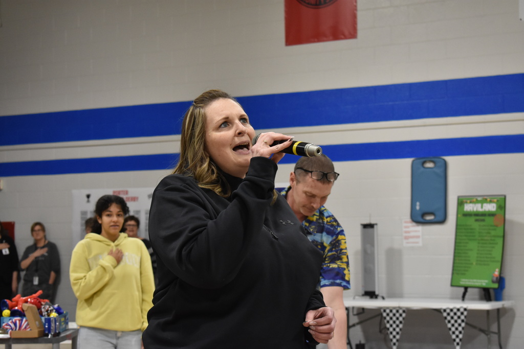 Amanda Davis, LISD employee, singing the National Anthem
