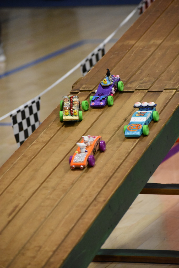 Cars racing to the finish line